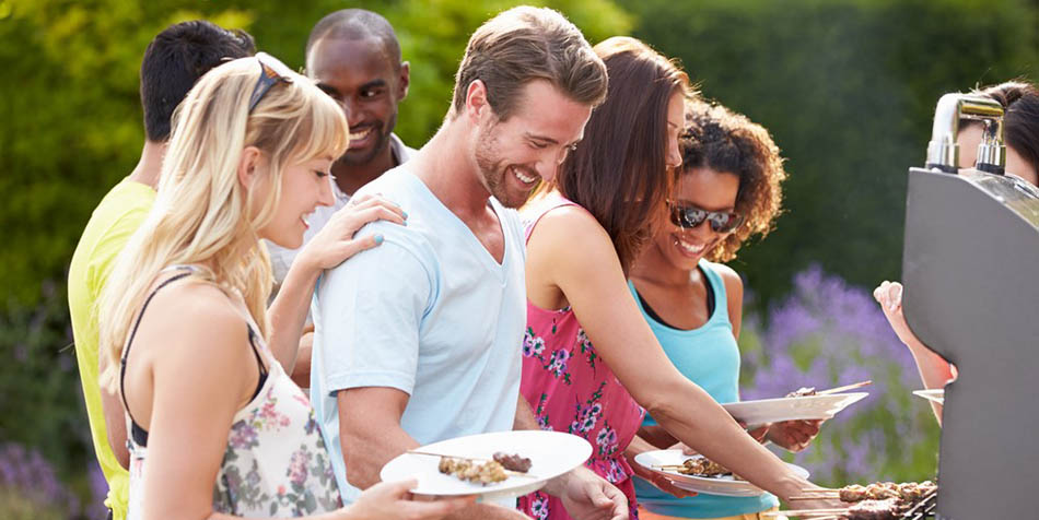 A group of friends at a barbecue.